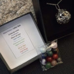 collier bola presentation Collier bola et ses 12 pierres